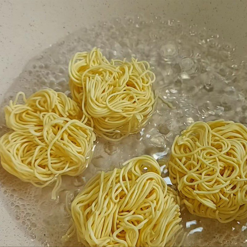 Step 1 Boil the noodles Vegetarian Longevity Noodles Soup