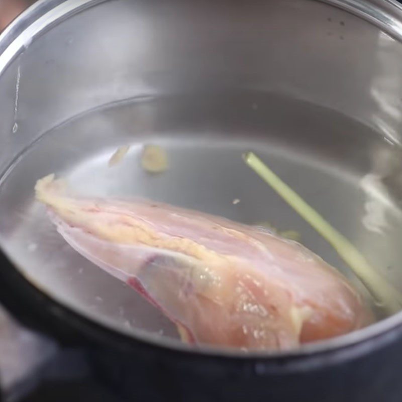 Step 2 Boil the chicken and shred it Crispy fried chicken rolled in pandan leaves