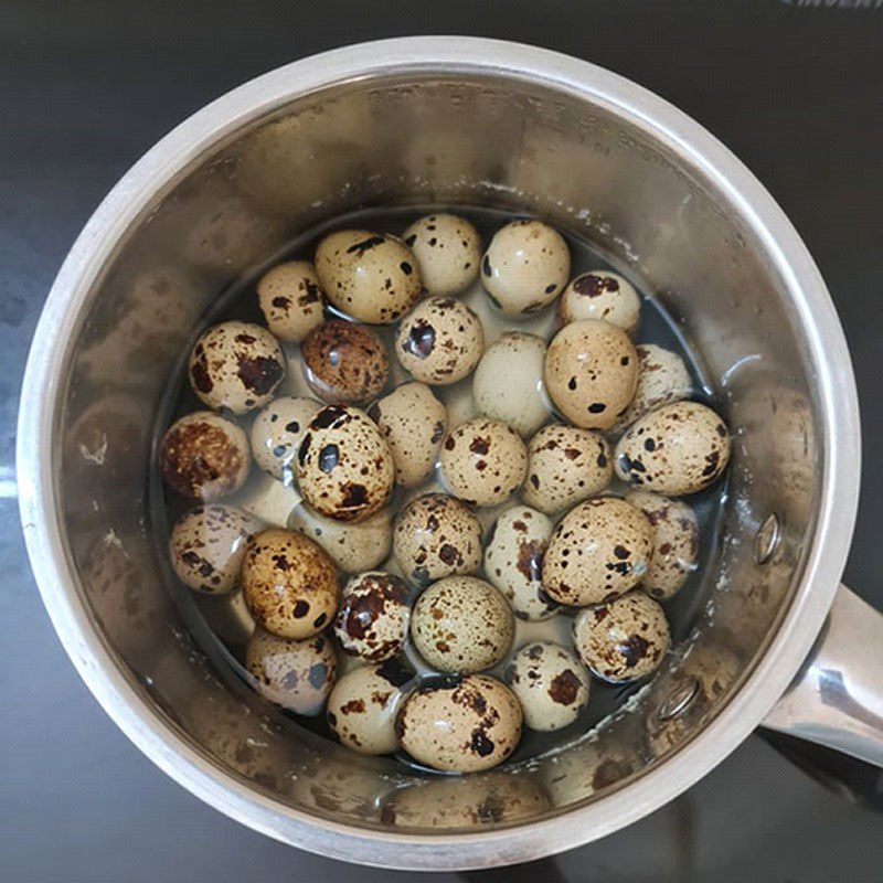 Step 1 Boil quail eggs Quail eggs sautéed with garlic butter