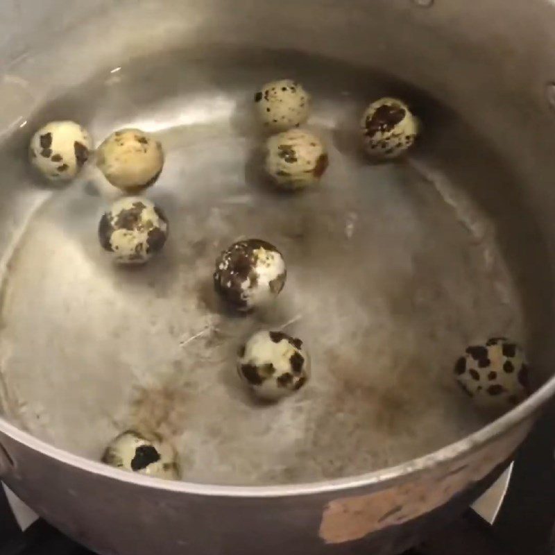 Step 3 Boil quail eggs Nail clam porridge