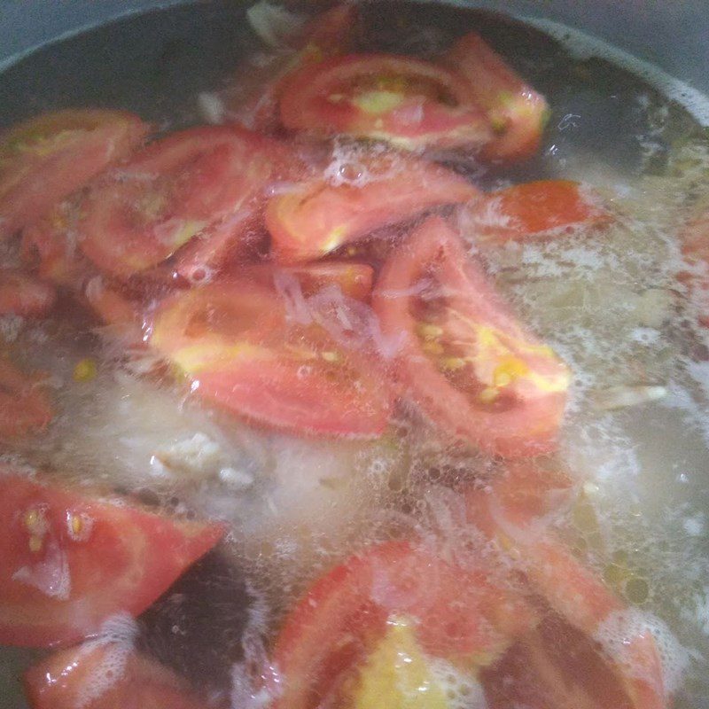 Step 2 Cooking sour leaf soup with red tilapia Sour leaf soup with red tilapia