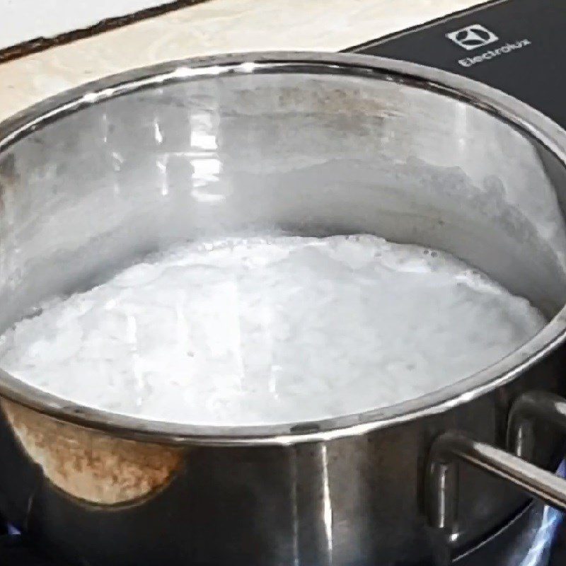 Step 2 Cooking porridge Porridge with striped bass for baby weaning with taro