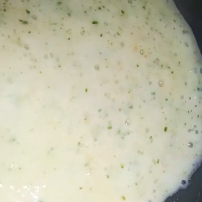 Step 3 Cook the porridge for squid porridge with carrot and mustard greens