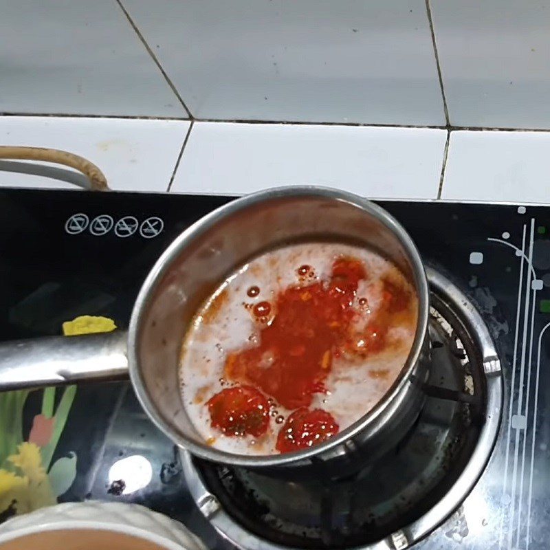 Step 2 Cook gac porridge Gac porridge for babies