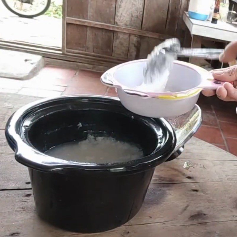 Step 3 Cook the porridge and complete Beef porridge with water spinach