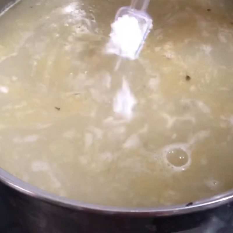 Step 6 Cooking porridge with quail intestines Porridge with razor clams