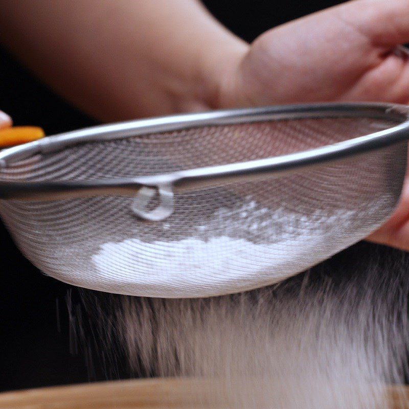 Step 2 Mix the flour mixture with palm sugar syrup for baked coconut cake