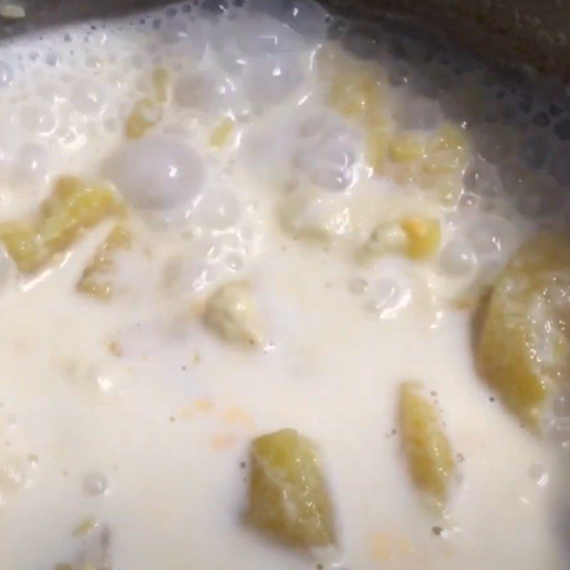 Step 2 Cook the sweet potato mixture with milk Chicken egg sweet potato porridge
