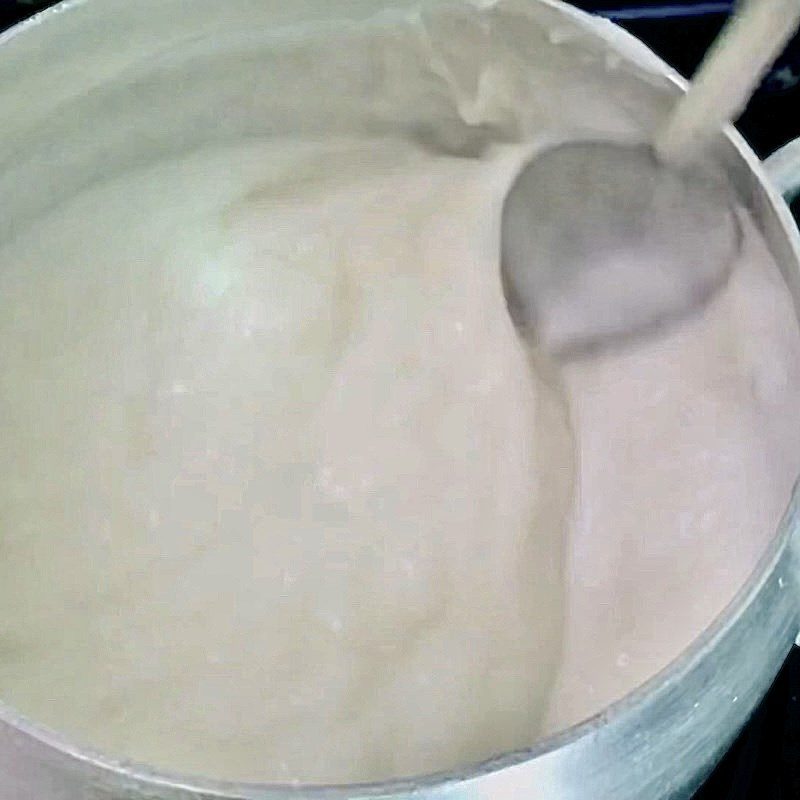Step 4 Cooking coconut milk for dessert Black bean dessert with sweet potato coconut milk