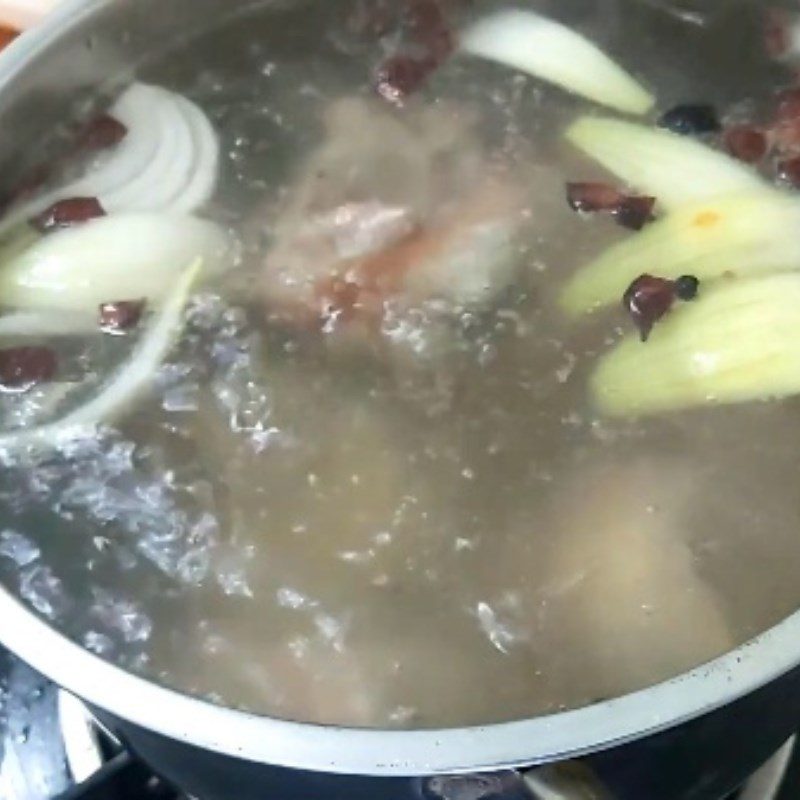 Step 3 Cook the broth for Hủ tiếu giò heo