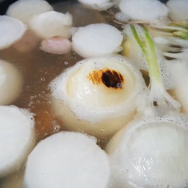 Step 4 Cooking the broth for Pork Hock Noodle Soup with Crispy Pork Fat and Satay