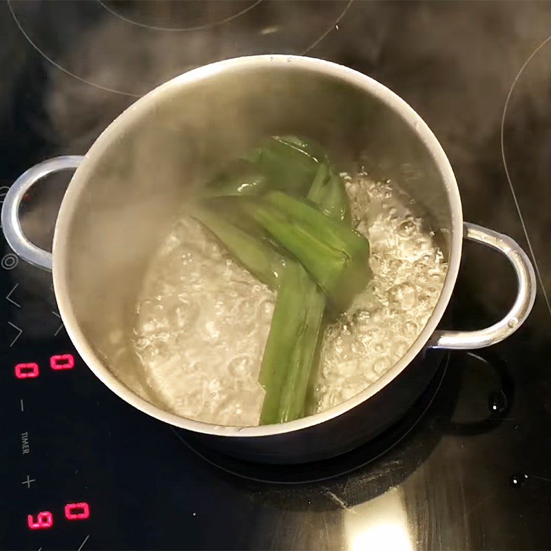 Step 3 Cook sugar syrup and coconut milk Taro banana dessert with tapioca pearls