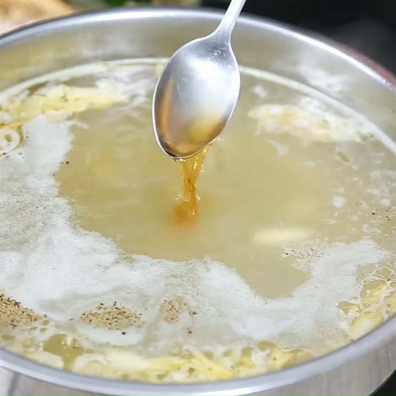 Step 2 Cook the broth for Spicy Sour Duck Hot Pot