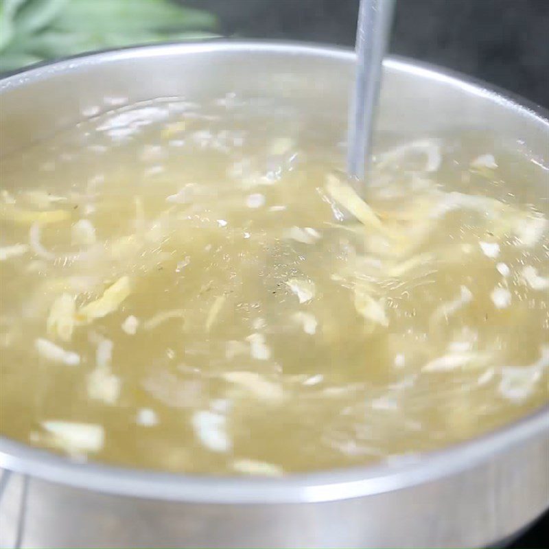 Step 2 Cook the broth for Spicy Sour Duck Hot Pot