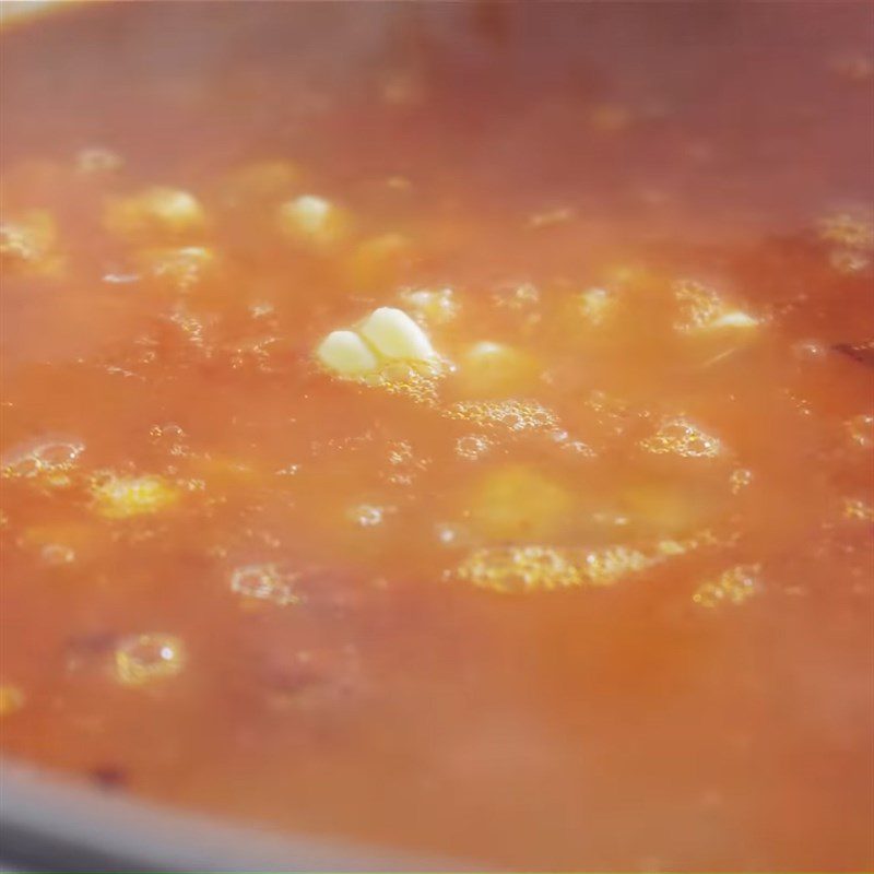 Step 5 Cook the soup Seafood Gấc Soup