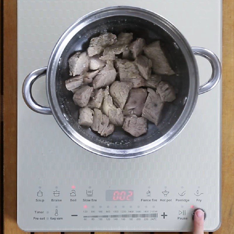 Step 3 Cooking shredded pork