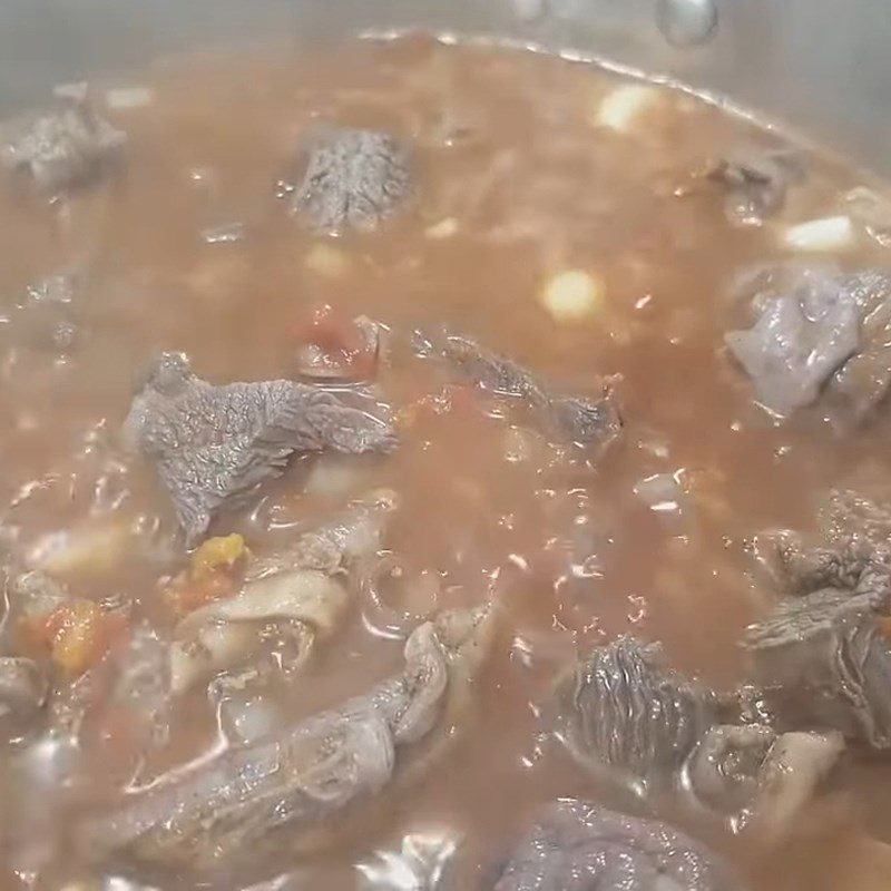 Step 5 Cooking beef with canned tomatoes and red wine French-style beef stew