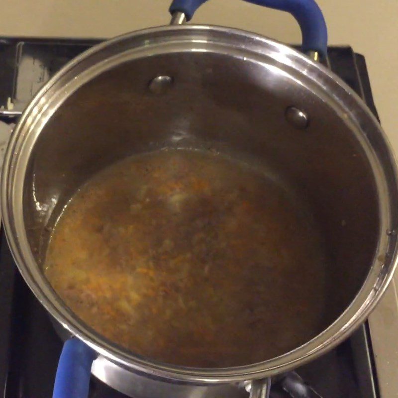 Step 4 Continue cooking beef with potatoes and carrots Potato beef porridge