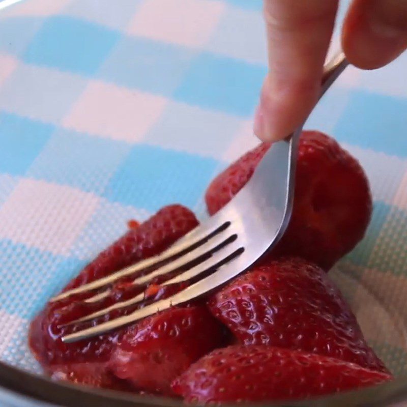 Step 1 Mash the strawberries for Strawberry Bingsu