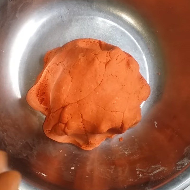 Step 3 Kneading the dough for gấc sweet dumplings with mung bean filling