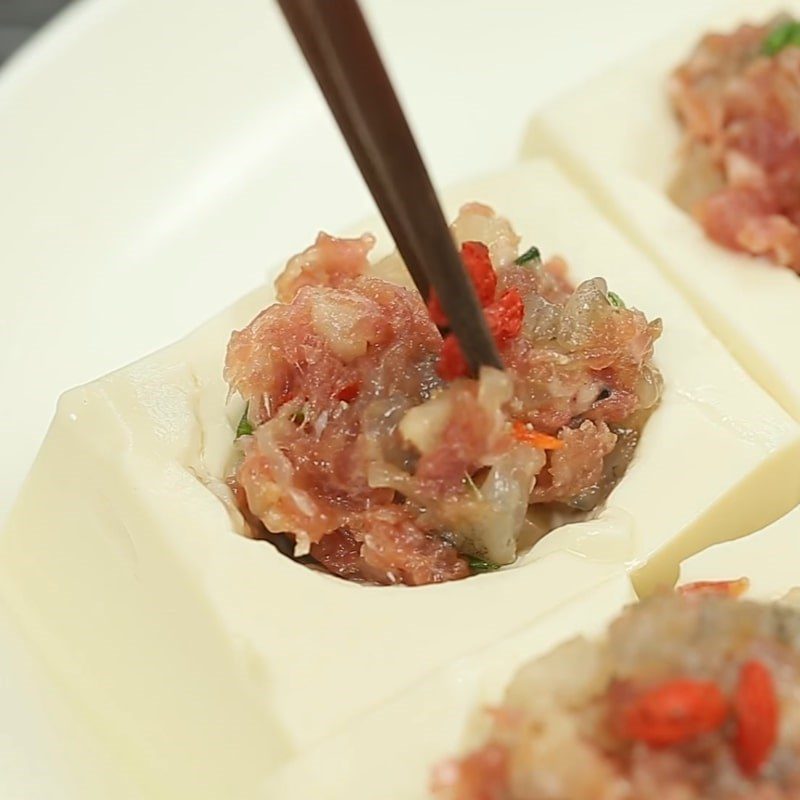 Step 2 Stuff the filling for Steamed Silken Tofu with Shrimp and Pork