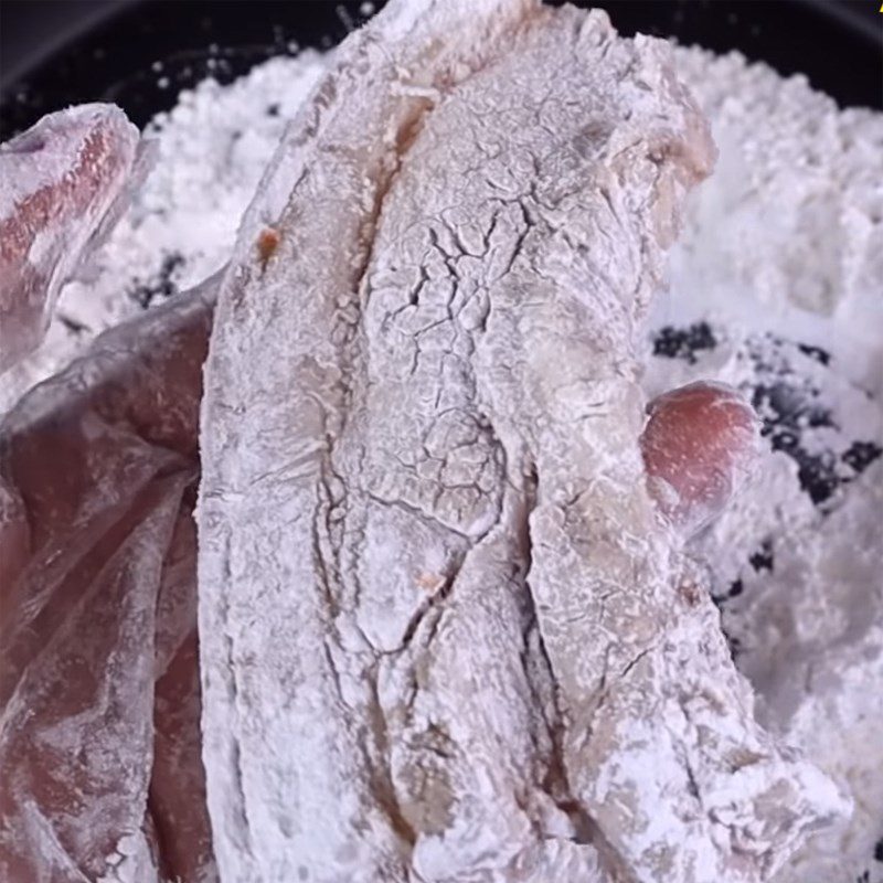 Step 5 Coating the meat Crispy pork belly fried in fish sauce