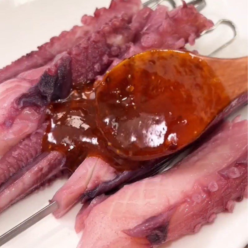 Step 2 Grilled octopus tentacles Grilled octopus tentacles with satay (Recipe shared from Tiktok Cooking with TasteVN)