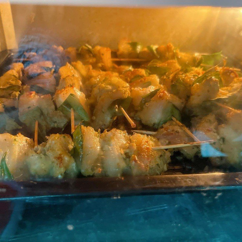 Step 3 Grilling meat Meat skewers with mắc mật leaves