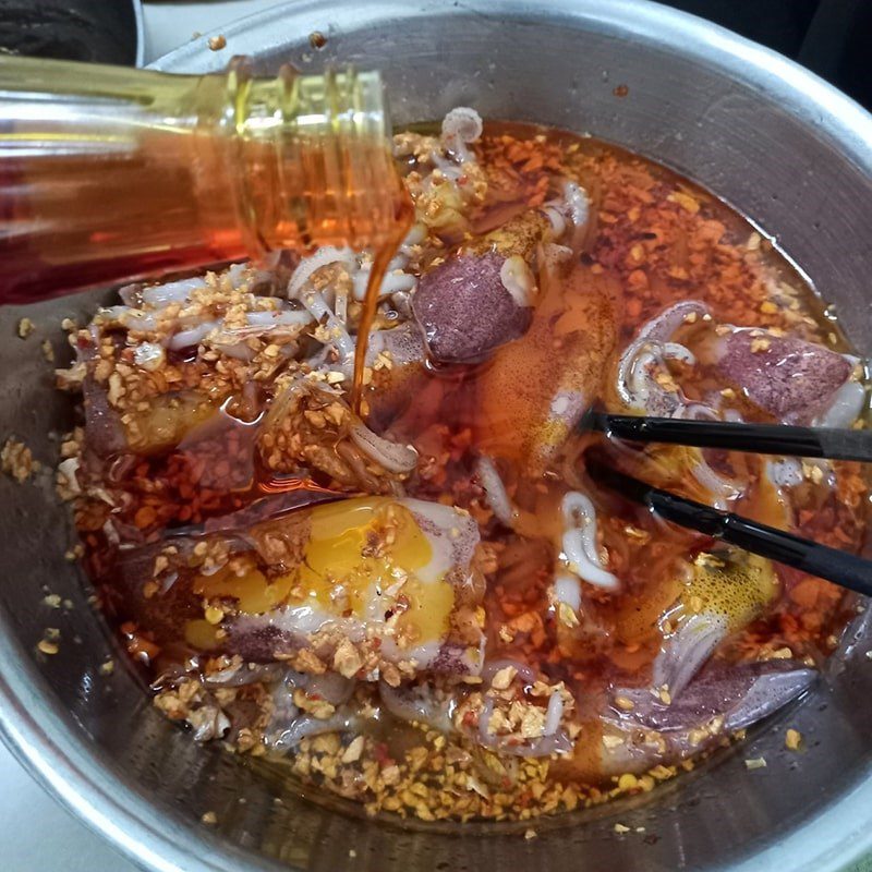 Step 3 Marinate squid for grilled squid with satay