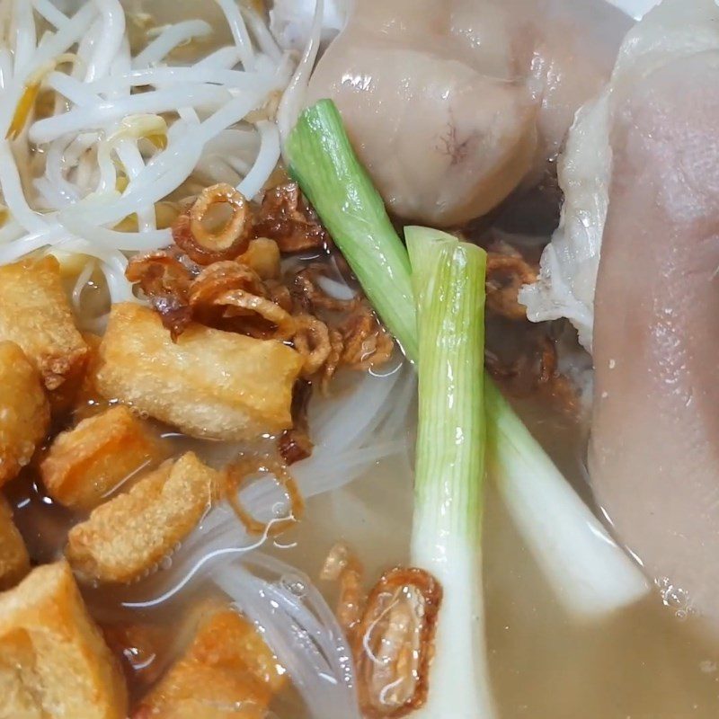 Step 7 Prepare the dipping sauce and finish Pork leg noodle with crispy pork fat and satay