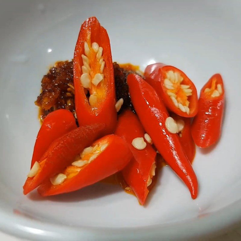 Step 7 Prepare the dipping sauce and finish Pork leg noodle with crispy pork fat and satay