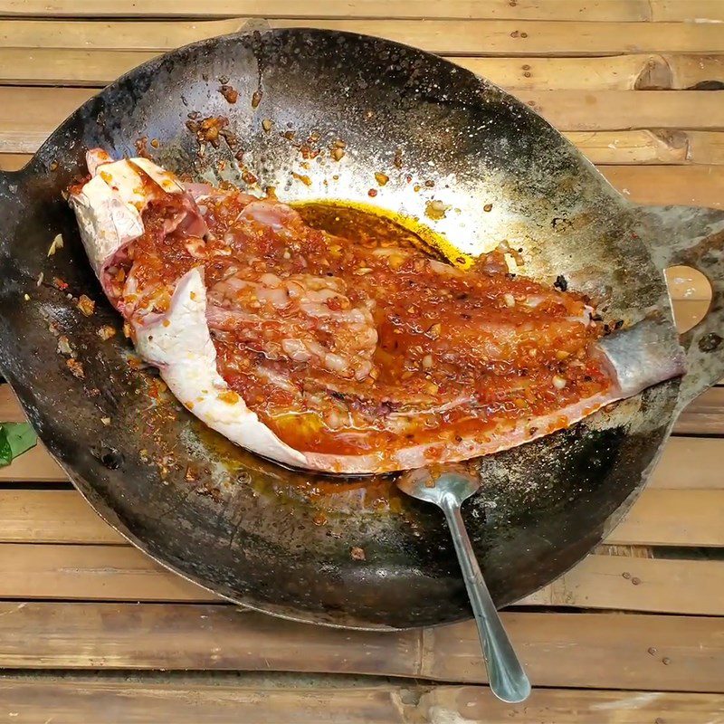 Step 2 Prepare the marinade and marinate the fish Grilled snakehead fish with salt, chili, and honey