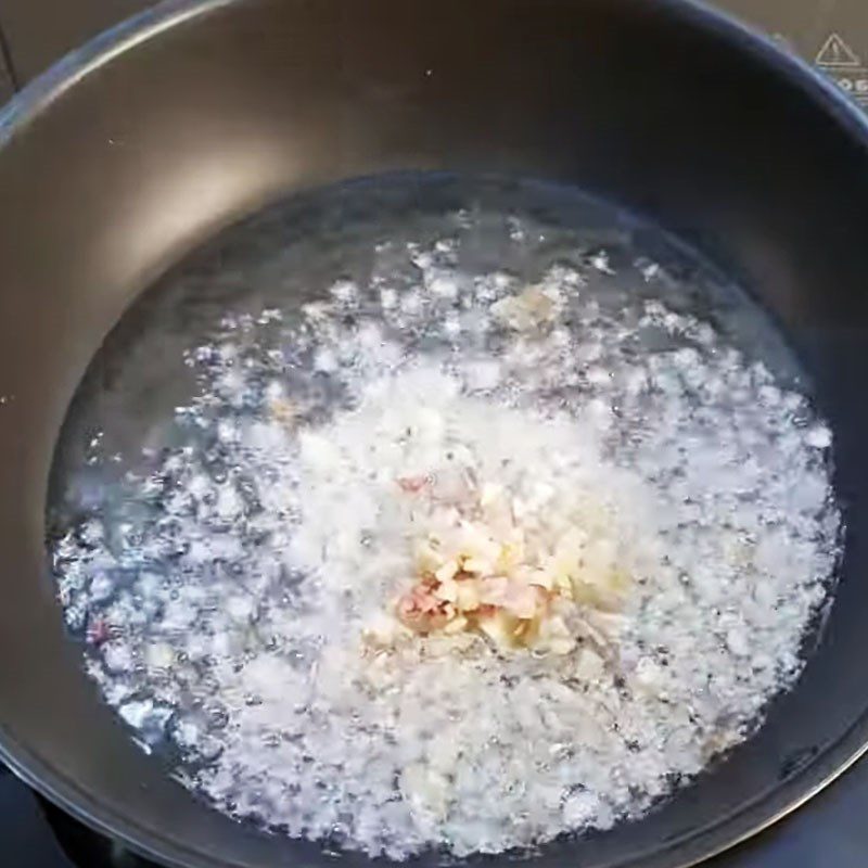 Step 6 Fry the spices until fragrant for Cái Tắc porridge