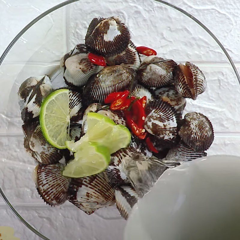 Step 1 Preparing long shell for Sour and Sweet Long Shell Salad