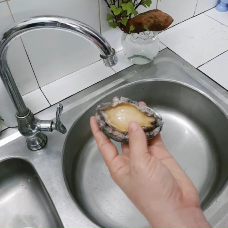 Step 1 Prepare abalone for Abalone Shiitake Mushroom Porridge