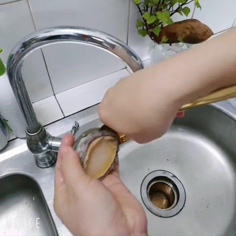 Step 1 Prepare abalone for Abalone Shiitake Mushroom Porridge