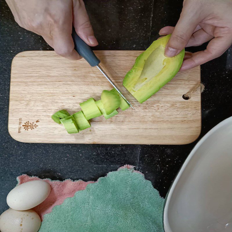 Step 1 Prepare the avocado for baked avocado with cheese and egg