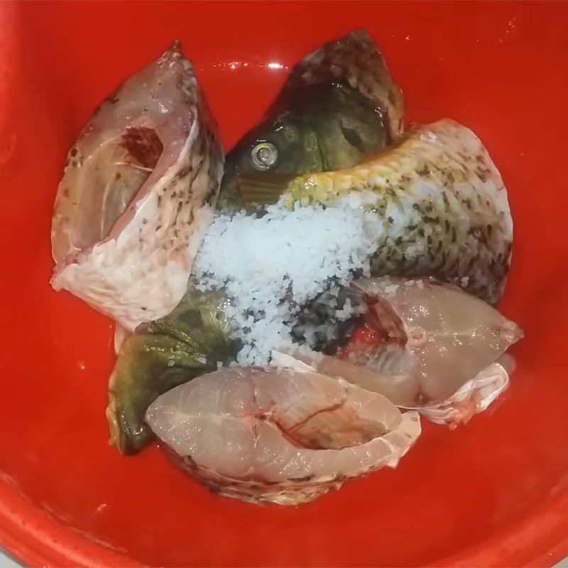 Step 1 Preparing carp for braised carp with white radish