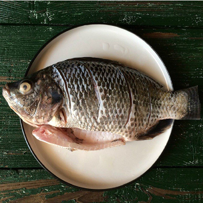 Step 1 Prepare the tilapia Steamed Tilapia with Soy Sauce