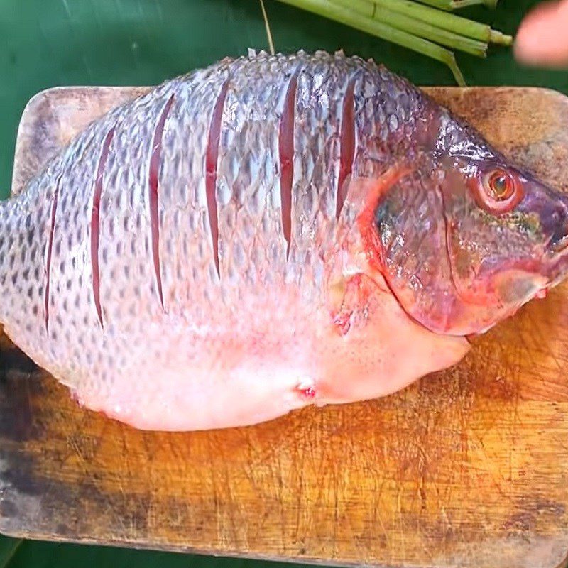 Step 1 Prepare the tilapia Beer steamed tilapia