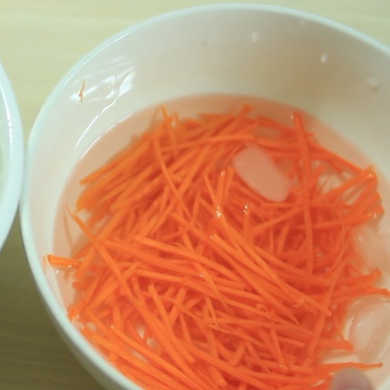 Step 1 Prepare the carrot for Crunchy cucumber and carrot salad