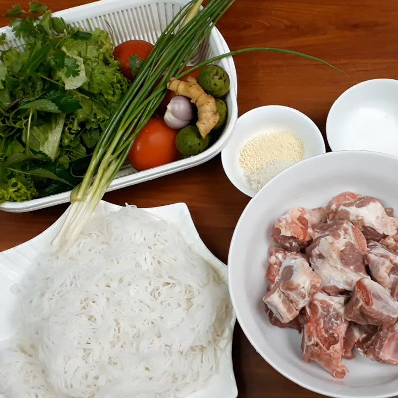 Step 2 Prepare the vegetables Bun Suon cooked with sour fruits