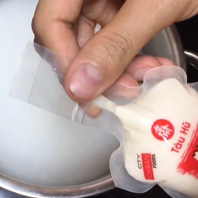 Step 1 Prepare the ingredients for Tomato Tofu Porridge