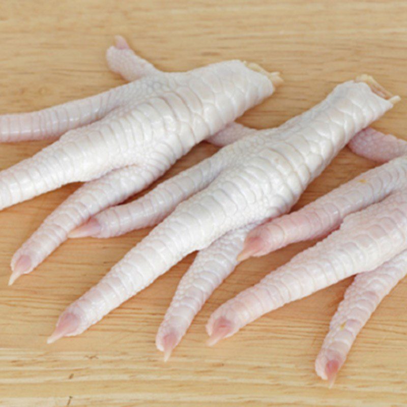 Step 1 Prepare chicken feet for Chicken Feet Abalone Hotpot