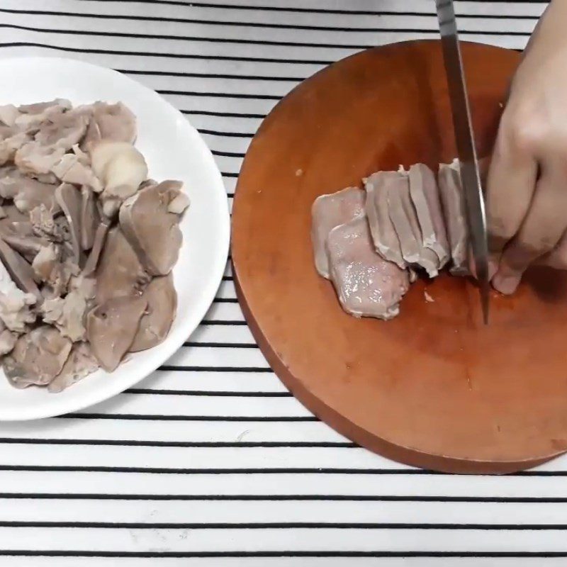 Step 1 Prepare the pork tongue (wash, remove odor, boil, cut) Spicy Sour Pork Tongue Salad