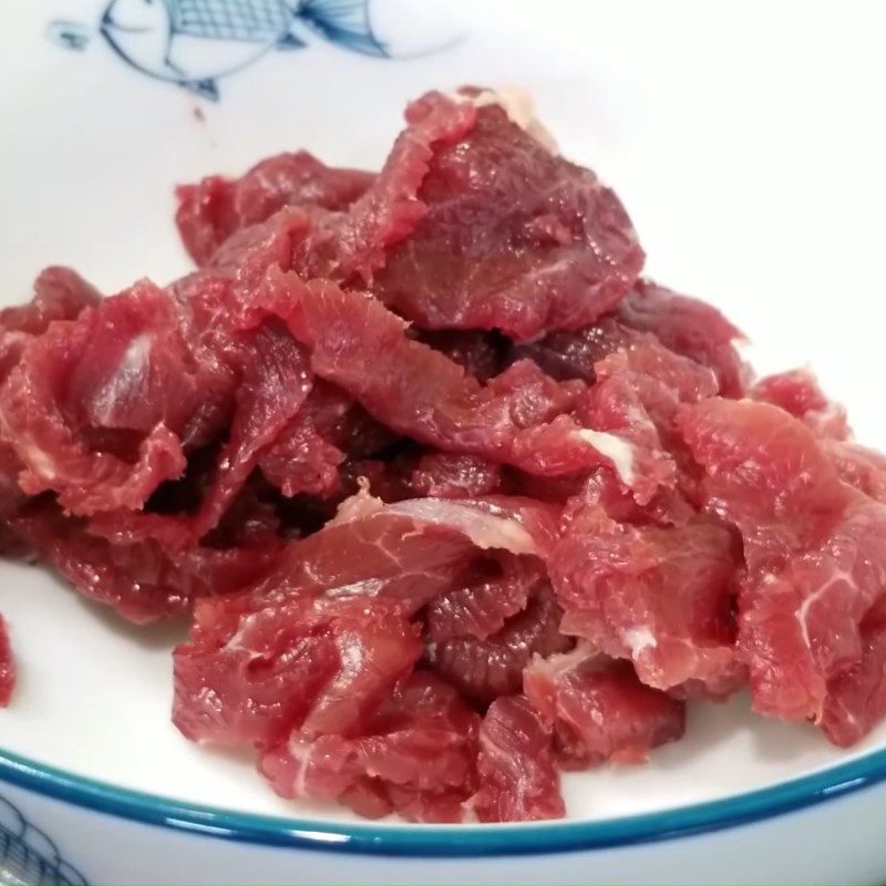 Step 1 Prepare and marinate the beef for Noodle Salad with Soy Sauce