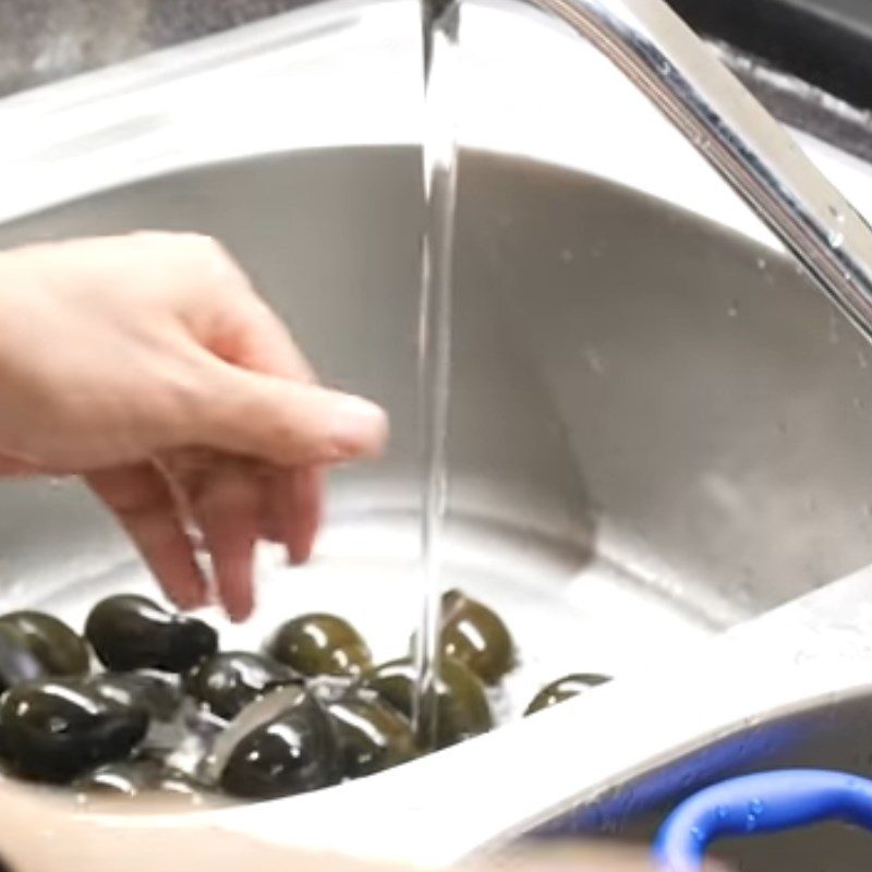 Step 1 Wash and boil the snails Cold Snail Noodles