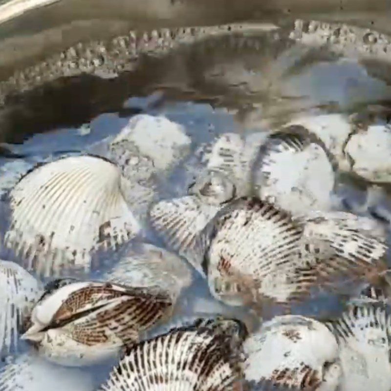 Step 1 Prepare sea snails for Sea Snail Salad with Cucumber and Tomato