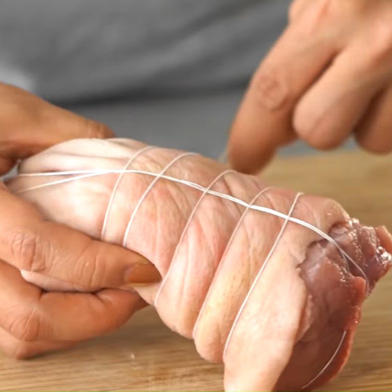 Step 1 Preprocessing and wrapping pork leg Soy Sauce Braised Pork Leg
