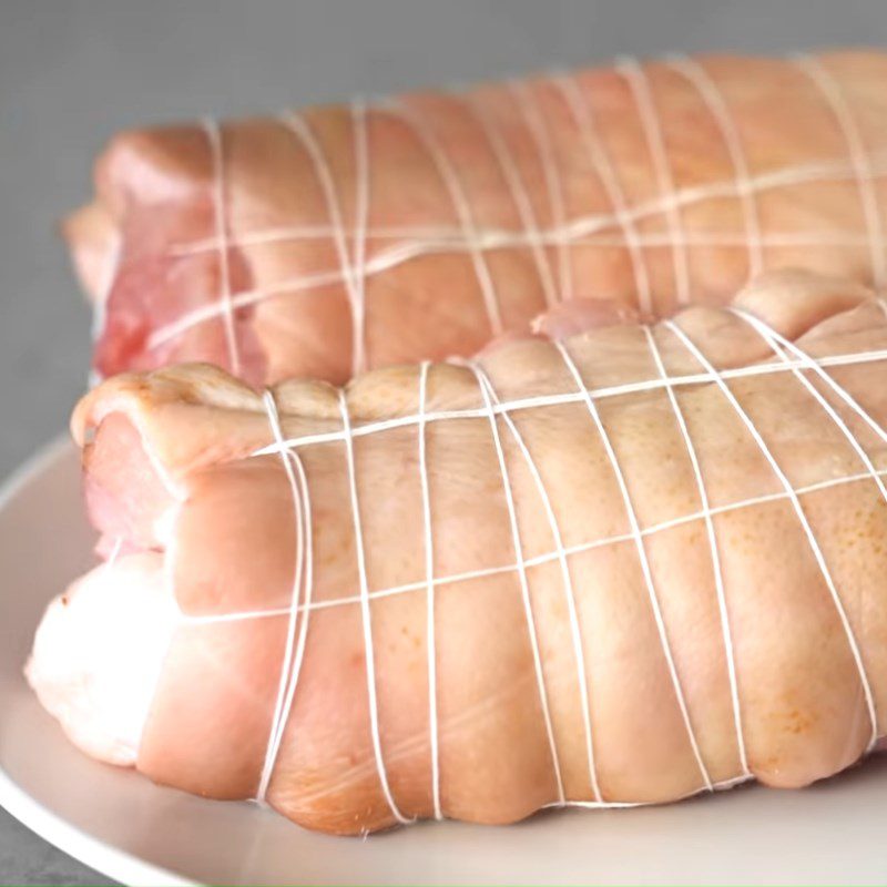 Step 1 Preprocessing and wrapping pork leg Soy Sauce Braised Pork Leg